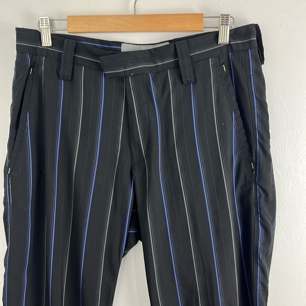 J Lindberg Black Golf Pants w/ Purple and Gray Pin Stripes